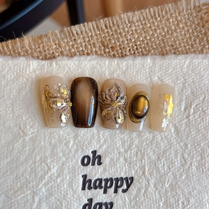 Golden embossed flower nail art stickers with French retro 3D floral and cat eye designs