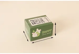 Detailed 45-degree angle view of a 4cm green miniature dollhouse courier box with a rabbit design