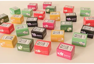 Miniature colorful dollhouse gift boxes with cute rabbit patterns and Happy text