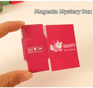 Close-up of a rose red miniature blind box package with cute cartoon rabbit and logistics icons