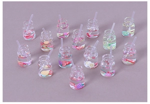 Miniature resin fruit juice bottles with straws and fruit slices for DIY crafts and decor