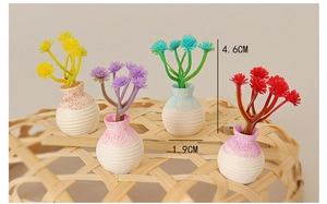 Set of four 4.6cm miniature dollhouse potted plants with colorful flowers and ceramic vases