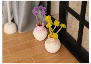 Miniature dollhouse vases with faux floral bouquets in pink and orange sandblast finish