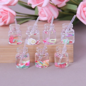 Miniature resin juice bottles set with fruit slices for DIY dollhouse crafts and decor