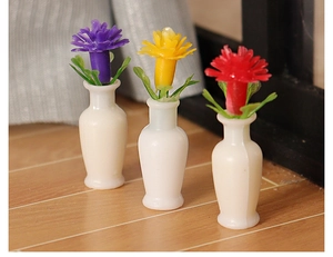 Three colorful miniature vases on wood floor for dollhouse tabletop scene decoration