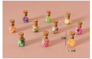 Miniature glass jars with colorful fruit slices and cork stoppers for dollhouse decor