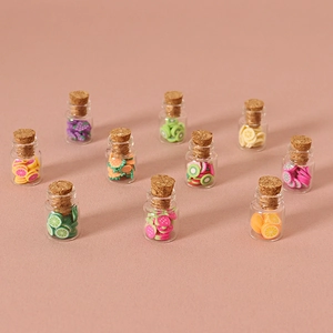 Set of 10 miniature glass jars with colorful clay fruit slices for dollhouse decor