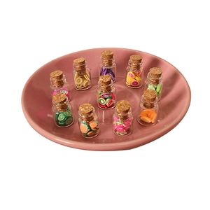 Set of 11 dollhouse miniature glass jars with colorful fruit slices for decor