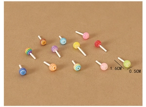 Primer plano de mini colgantes de piruleta 3D de 1,6 cm para accesorios de pelo DIY