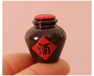 Miniature brown resin wine jar with red seal and Chinese character for dollhouse decor