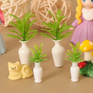 Miniature dollhouse green plants in white ceramic vases for desktop creative decoration