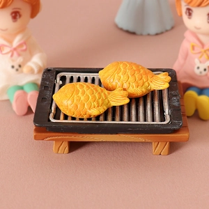 Miniature dollhouse BBQ grill set with golden Taiyaki models on black grate