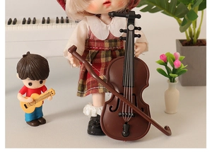 Miniature cello model with bow and boy figurine for dollhouse musical scene decoration