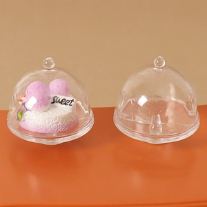 Miniature dollhouse cake display dome with purple cake and white base stand