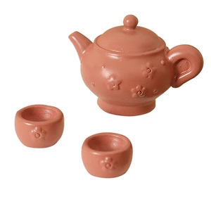 Miniature dollhouse ceramic teapot set with 3D flower carvings and two small cups