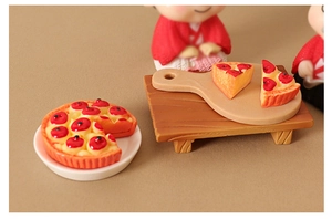 Detailed view of miniature dollhouse pizza and fruit tart food model set