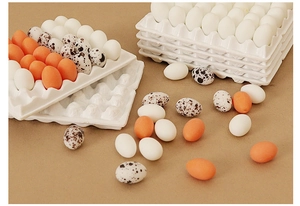 Miniature white dollhouse egg tray with stackable design for realistic tiny food scenes