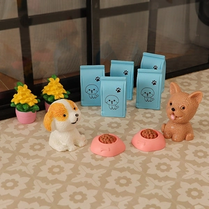 Miniature dollhouse pet set with two small puppy figurines and tiny accessories