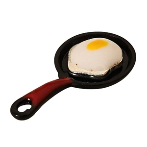 Miniature dollhouse frying pan with realistic fried egg and red handle kitchen accessory
