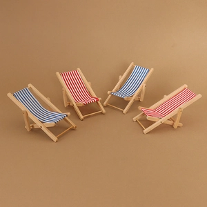 Miniature wooden folding beach chairs with blue and red striped fabric for dollhouses
