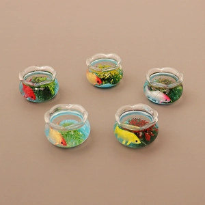 Set of five miniature dollhouse fish tanks with resin goldfish and aquatic plants
