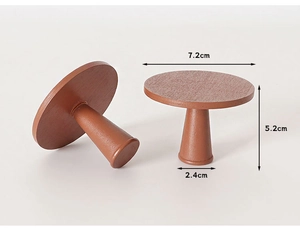 Detailed view of mushroom-shaped wooden miniature table with dimensions 7.2cm by 5.2cm
