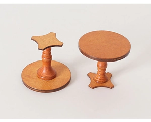 Detailed view of miniature wooden round tables with natural grain for dollhouse decor