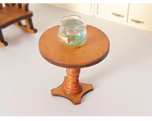 Miniature round wooden table with a tiny glass fish tank for dollhouse decoration