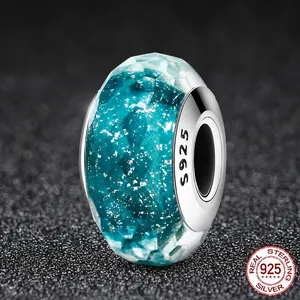 S925 sterling silver faceted teal glass charm bead with sparkling silver foil accents