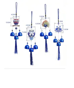 Blue owl and peacock resin wind chimes with metallic bells and tassels for home decor