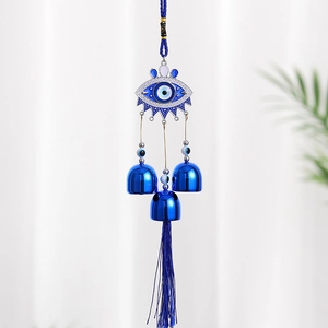 Blue Turkish evil eye wall hanging decor with metal bells and long silk tassels