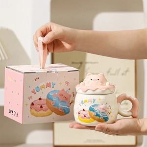Detail of pink ceramic piggy mug with a 3D lid inside a matching luxury gift box
