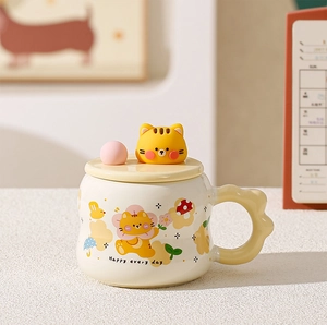 Detailed view of ceramic mug with cartoon cat lid and wavy handle on cream body