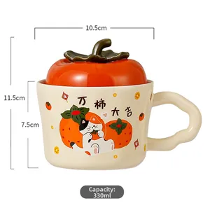 Detail of 330ml persimmon ceramic mug featuring orange lid and cute cat illustration