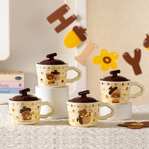 Set of four cute ceramic bear mugs with lids and wavy handles for coffee or tea