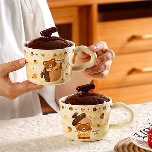 Minimalist ceramic bear mug with lid featuring cute autumn forest illustrations and patterns