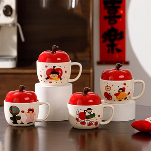 Set of four festive ceramic mugs with red apple lids and cute cartoon illustrations