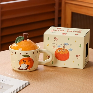 Cute ceramic mug with 3D orange lid and white cat illustration in a premium gift box