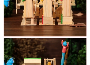 Détail de la boîte à musique moulin à vent en bois et porte-stylo peint à la main