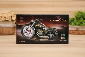 Detail view of motorcycle alarm clock packaging NO.PF168A with CE certification logo