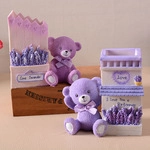 Detailed view of creative lavender purple bear pen holder and desk decorative set