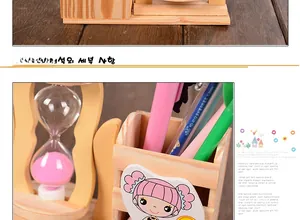 Detail of wooden pencil holder featuring a pink sand hourglass and cartoon girl design