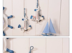 Detail view of Mediterranean wood anchor thermometer with shells and nautical nets