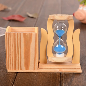 Wooden pen holder with blue sand hourglass on base, creative office desk decoration