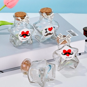 Star shaped glass wishing bottles with cork stoppers and decorative ribbons for gifts