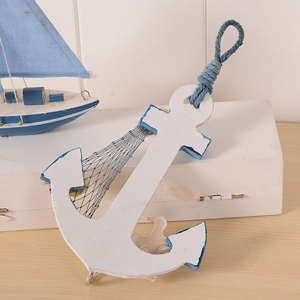 Mediterranean wood anchor wall decor with nautical fish net and thermometer