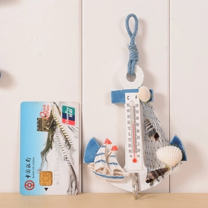 Mediterranean wooden anchor thermometer wall decor with white finish and blue rope details
