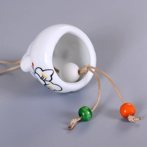 Hand-painted white ceramic cat wind chime with wooden beads and rustic jute hanging rope