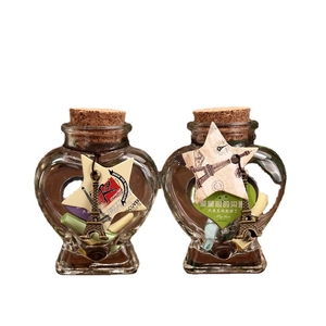 Luminous heart-shaped glass wishing bottles with Eiffel Tower charms and cork stoppers