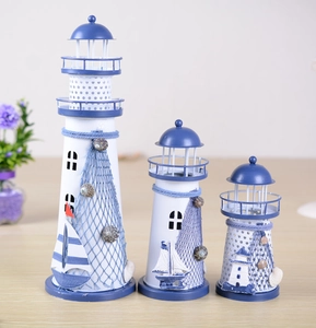 Detailed set of three Mediterranean iron lighthouses with blue nets and small seashells